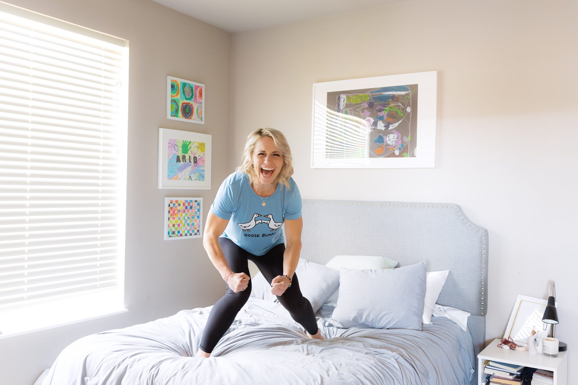 Woman full of joy and movement during her transformational portrait session in Wisconsin
