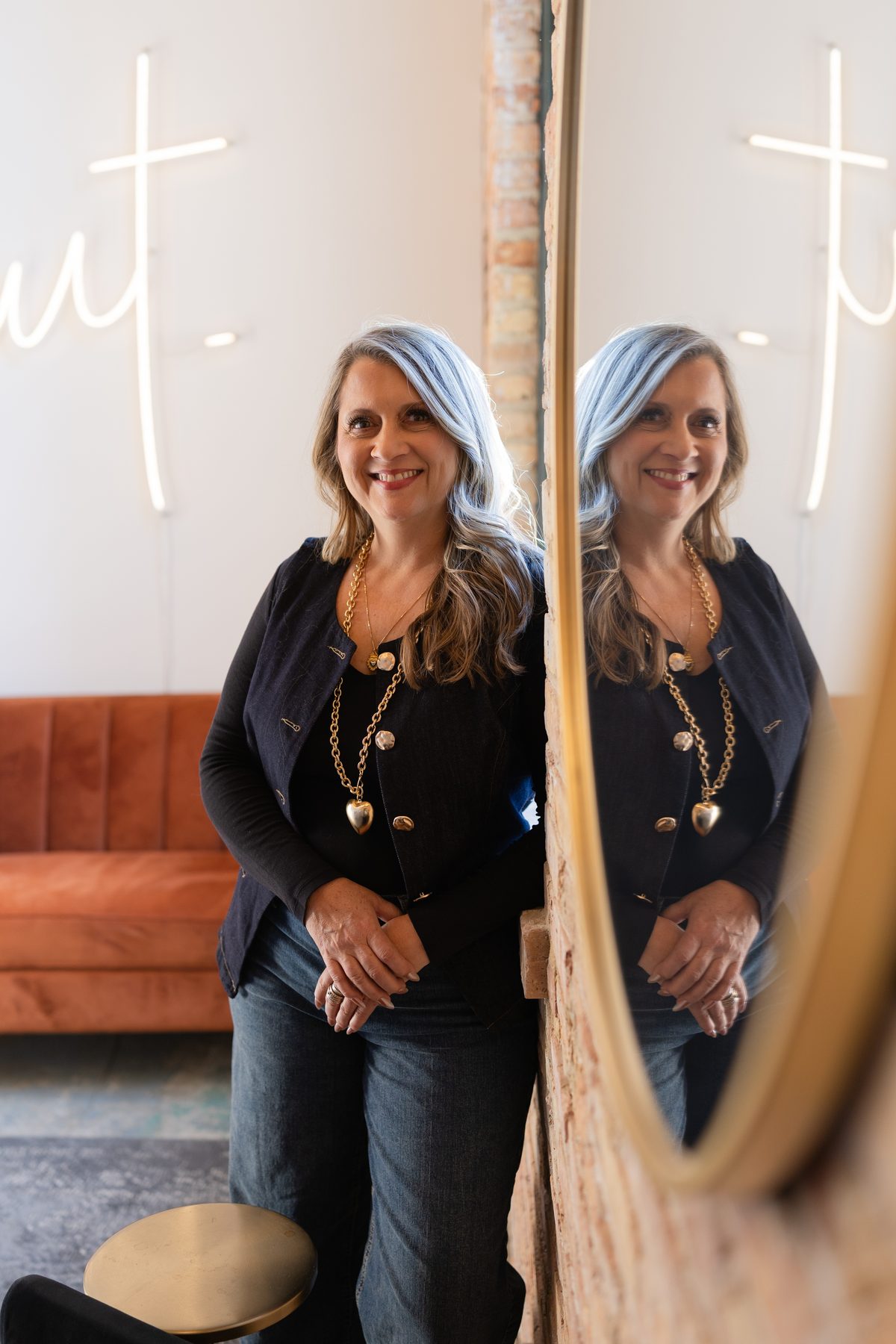Two reflections, one woman finally seeing herself clearly &mdash; transformational portrait session in Wisconsin