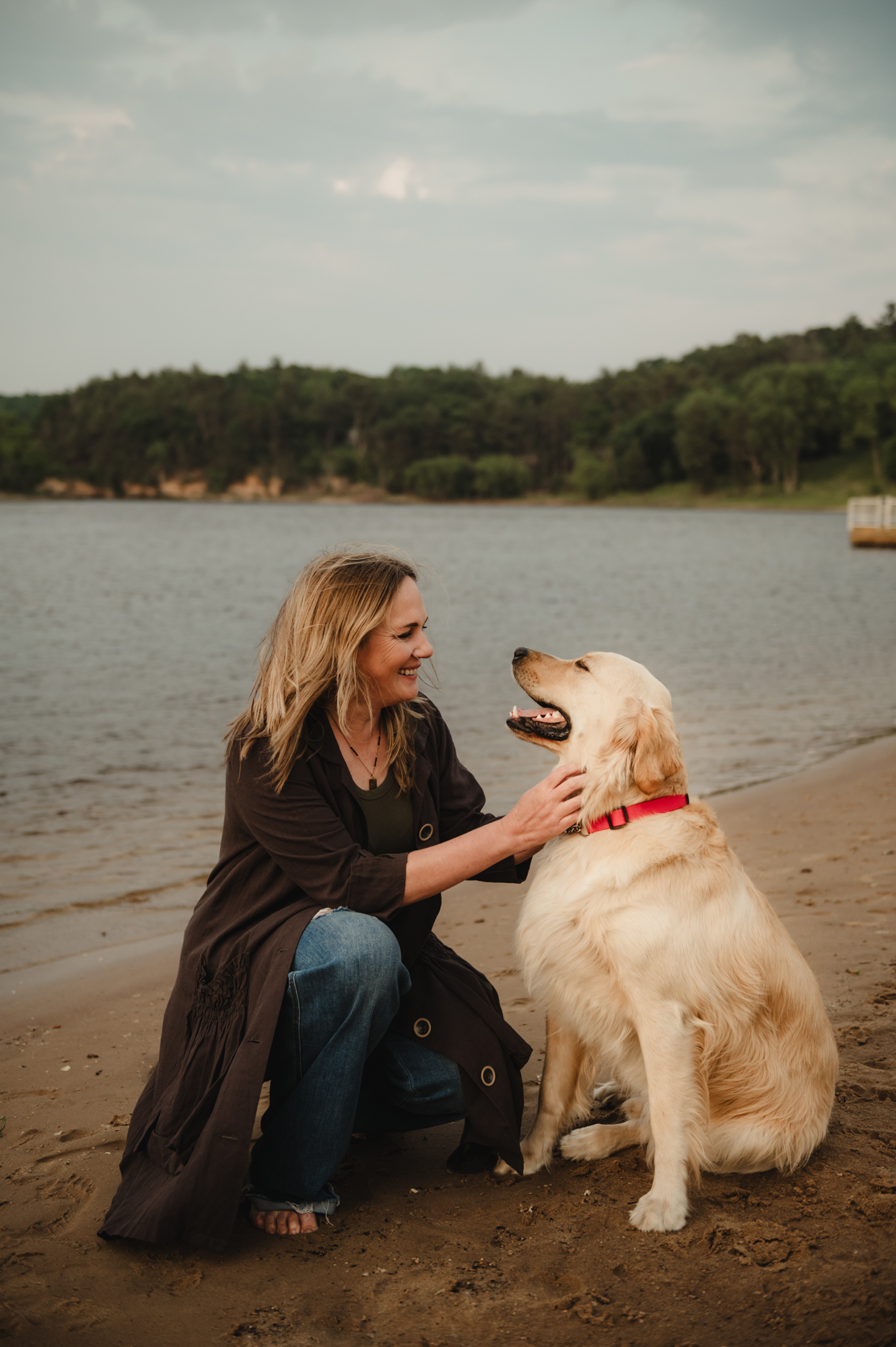 Steph Shanks with her dog by the lake